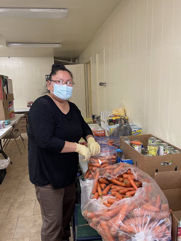CVT volunteers with fresh produce