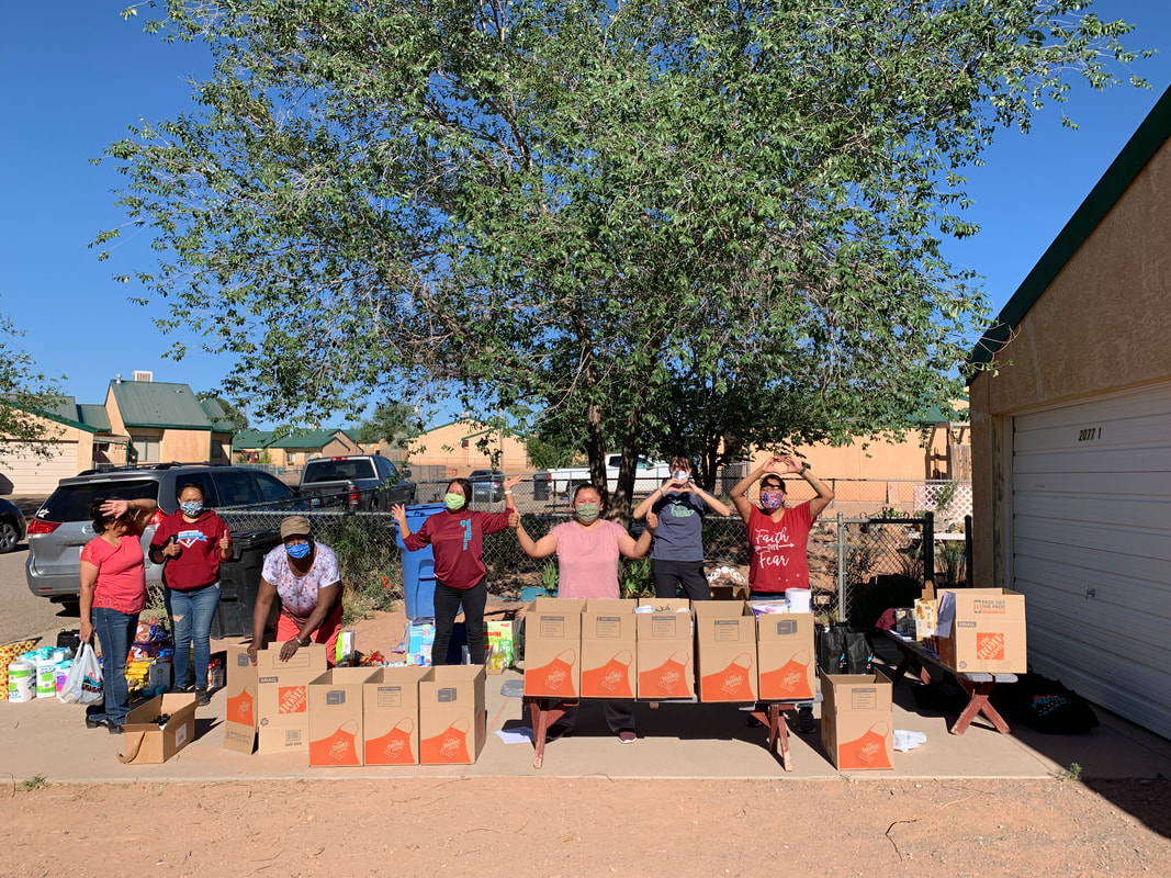 CVT team with supply boxes